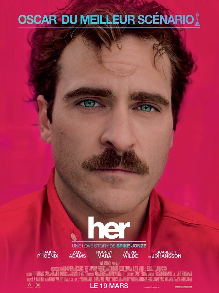 Affiche minimaliste montrant Joaquin Phoenix en gros plan sur un fond rouge intense, évoquant l'intimité, la solitude et la relation entre un homme et une intelligence artificielle.