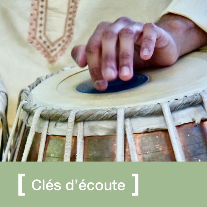 Une main posée sur un tambour