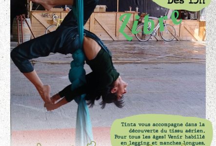 Tinta tient une pause acrobatique dans le tissu aérien au Jardins de la Jonction