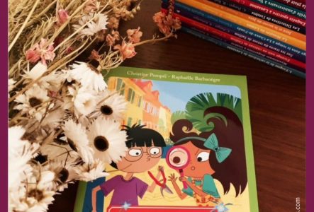 @Maude-www.bouquineries.com Image en couleur du livre "Le voleur de fleurs de Carouge", de la série "Les enquêtes de Maëlys", avec sur la couverture une petite fille et un petit garçon.