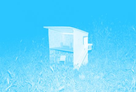 La miniature d'une maison sur l'herbe. La photo a un filtre de couleur.