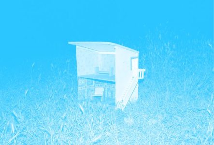 La miniature d'une maison sur l'herbe. La photo a un filtre de couleur.