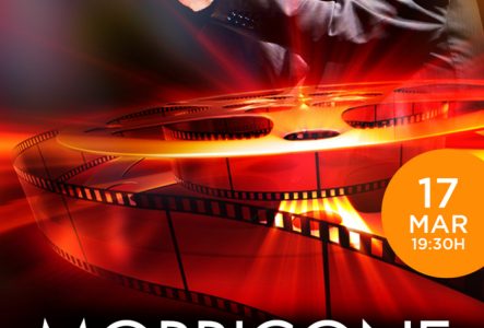 Affiche de la soirée - une pélicule de film sur fond noir/orangée, montant un Maestro dirigé